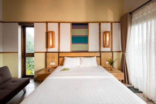 Ảnh chi tiết phòng bakhan-village-resort-mai-chau-deluxe-room-vivatrip-03.webp