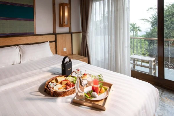 Ảnh chi tiết phòng bakhan-village-resort-mai-chau-deluxe-room-vivatrip.webp
