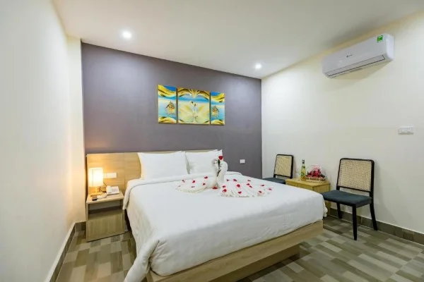 Ảnh chi tiết phòng cat-ba-violet-hotel-phong-giuong-doi-vivatrip-02.webp