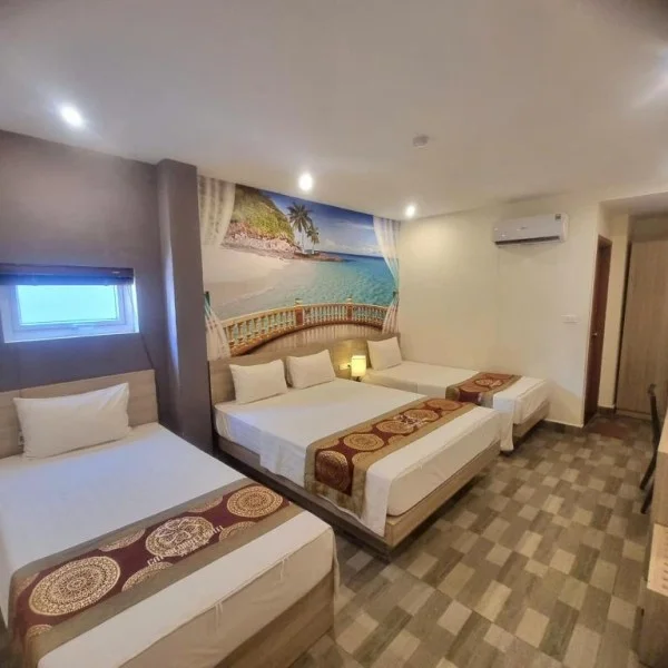 Ảnh chi tiết phòng cat-ba-violet-hotel-phong-ngu-tap-the-vivatrip-02.webp