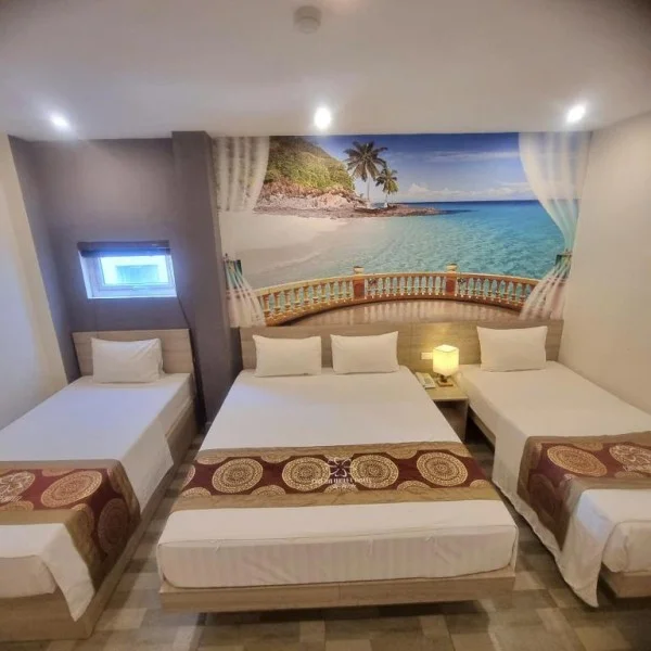 Ảnh chi tiết phòng cat-ba-violet-hotel-phong-ngu-tap-the-vivatrip-03.webp