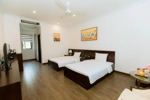 Ảnh chi tiết phòng glory-resort-son-tay-phong-deluxe-2-giuong-don-vivatrip-04.webp