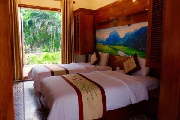 Ảnh chi tiết phòng hang-mua-ecolodge-ninh-binh-phong-deluxe-giuong-doi-2-giuong-vivatrip.webp