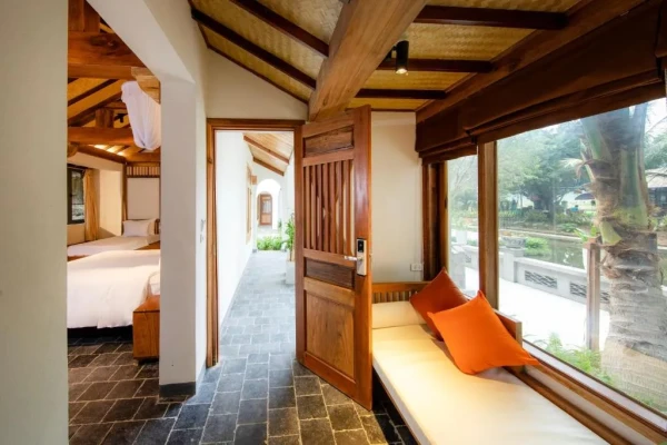 Ảnh chi tiết phòng hang-mua-ecolodge-ninh-binh-suite-deluxe-giuong-doi-2-giuong-don-vivatrip-04.webp