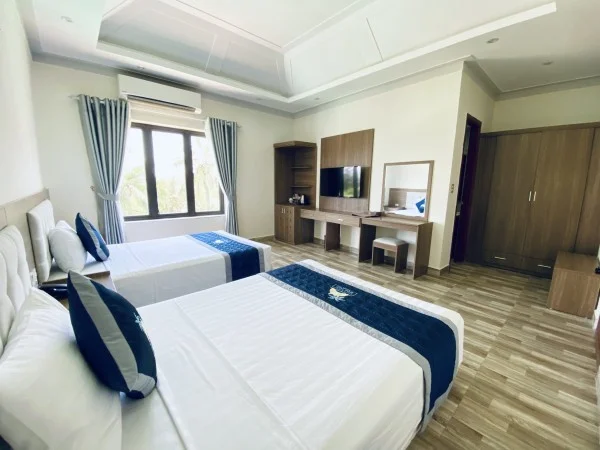 Ảnh chi tiết phòng holiday-hon-dau-resort-standard-twin-vivatrip-05.webp