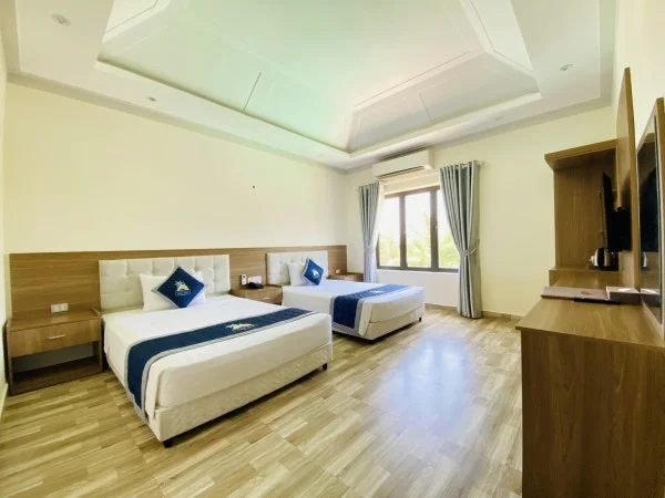 Ảnh chi tiết phòng holiday-hon-dau-resort-standard-twin-vivatrip-06.webp