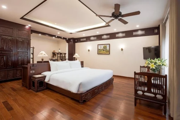 Ảnh chi tiết phòng khu-nghi-duong-emeralda-resort-tam-coc-phong-deluxe-giuong-doi-2-giuong-don-vivatrip-05.webp
