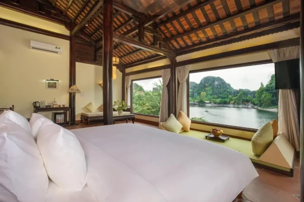 Ảnh chi tiết phòng khu-nghi-duong-emeralda-resort-tam-coc-phong-imperial-giuong-doi-vivatrip.webp