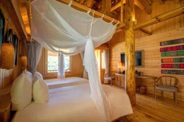 Ảnh chi tiết phòng le-champ-tu-le-resort-hot-spring-spa-studio-bungalow-giuong-doi-vivatrip-05.webp