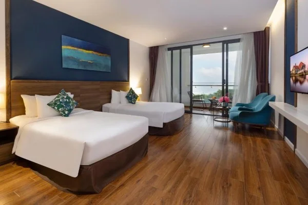 Ảnh chi tiết phòng le-palmier-ho-tram-resort-phong-delixe-2-giuong-don-vivatrip.webp