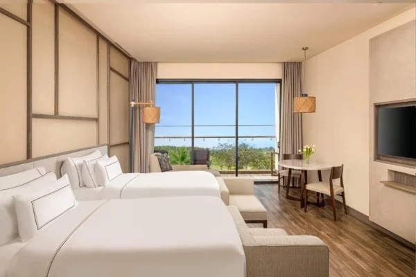 Ảnh chi tiết phòng melia-ho-tram-beach-resort-deluxe-giuong-doi-2-giuong-don-co-ban-cong-vivatrip-02-1.webp