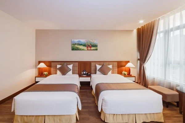 Ảnh chi tiết phòng muong-thanh-holiday-moc-chau-hotel-phong-deluxe-2-giuong-don-vivatrip-04.webp