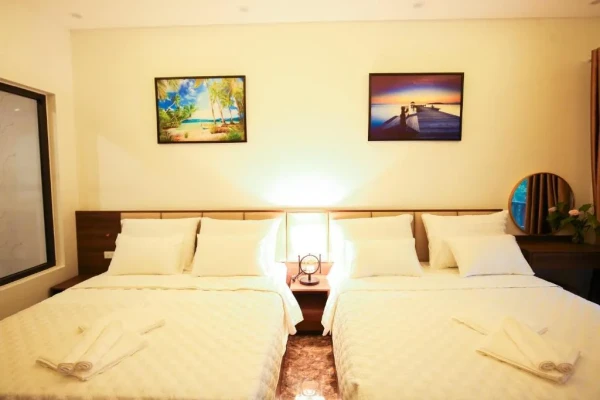 Ảnh chi tiết phòng resort-trang-an-ninh-binh-phong-deluxe-co-2-giuong-co-queen-vivatrip-02.webp