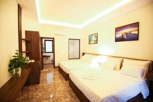 Ảnh chi tiết phòng resort-trang-an-ninh-binh-phong-deluxe-co-2-giuong-co-queen-vivatrip-03.webp