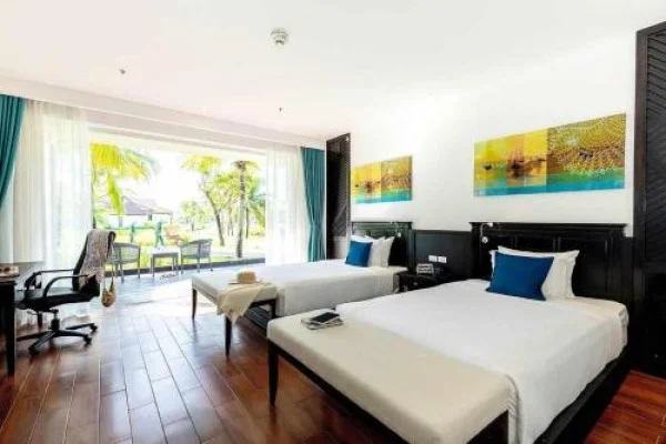 Ảnh chi tiết phòng robinson-nam-hoi-an-deuxe-double-or-twin-room-with-garden-vivatrip-03.webp