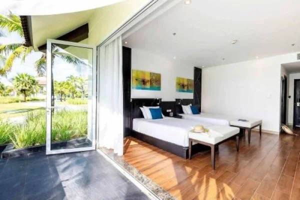 Ảnh chi tiết phòng robinson-nam-hoi-an-deuxe-double-or-twin-room-with-garden-vivatrip-04.webp