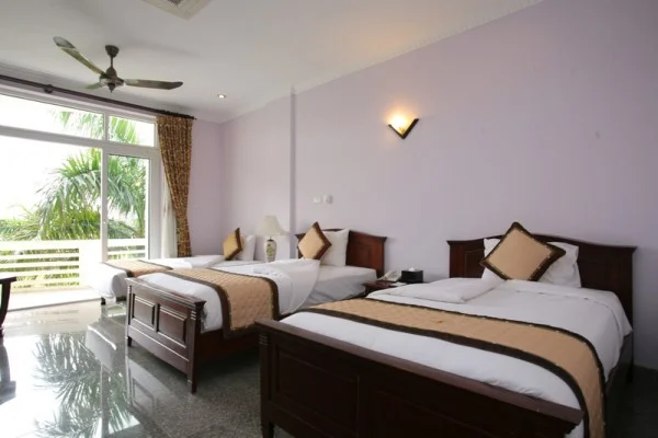 Ảnh chi tiết phòng song-hong-resort-phong-3-giuong-don-vivatrip.webp