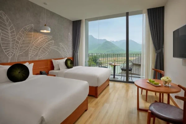Ảnh chi tiết phòng vedana-resort-ninh-binh-phong-deluxe-giuong-doi-2-giuong-don-vivatrip.webp